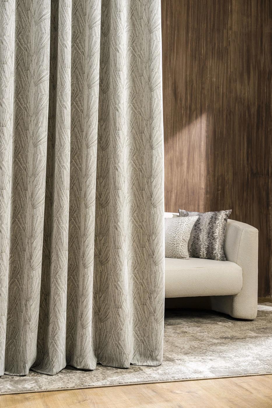 Self-textured woven curtain in a living room